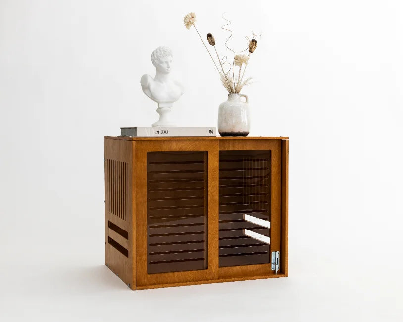 the Pad in the smaller size, styled with an AD100 book, a bust and dried stems on top